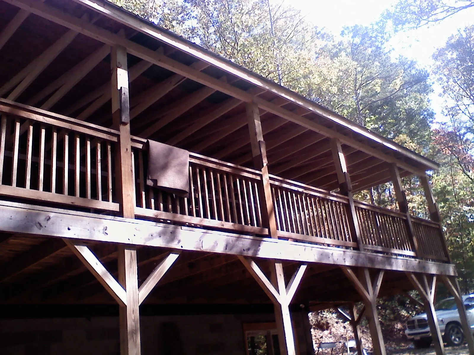 Timber framing under a new elevated porch and deck — Roof Leak Repair in Collegeport by Roofing Brothers